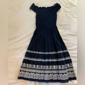 Max Studio Large off shoulder, cinching waist, below the knee.